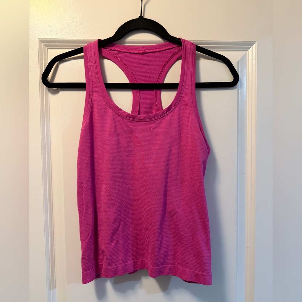 Lululemon Swiftly Tech Racerback
Tank Top Waist Length in Sonic Pink, size 6